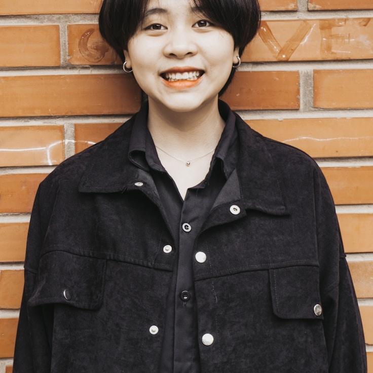 Kaveri Mehta, Lead Design Curator at ForestPaperPath, reviewing corporate floral arrangements